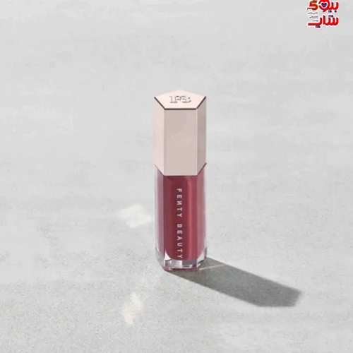 لیپ گلاس شایندار فنتی بیوتی رنگ Riri فولسایز اصل اروپایی FENTY BEAUTY GLOSS BOMB UNIVERSAL LIP LUMINIZER RIRI